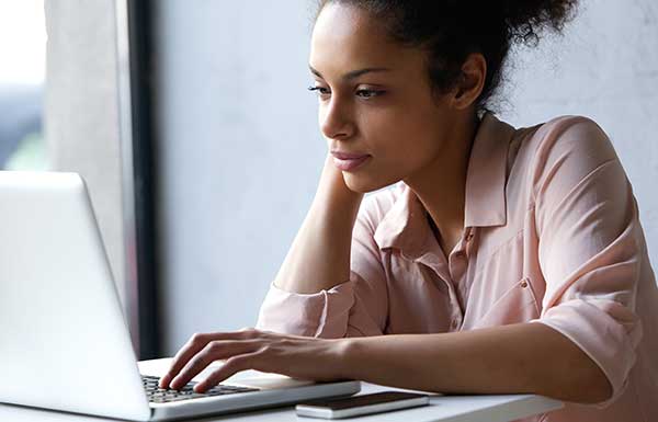 Young woman working on laptop