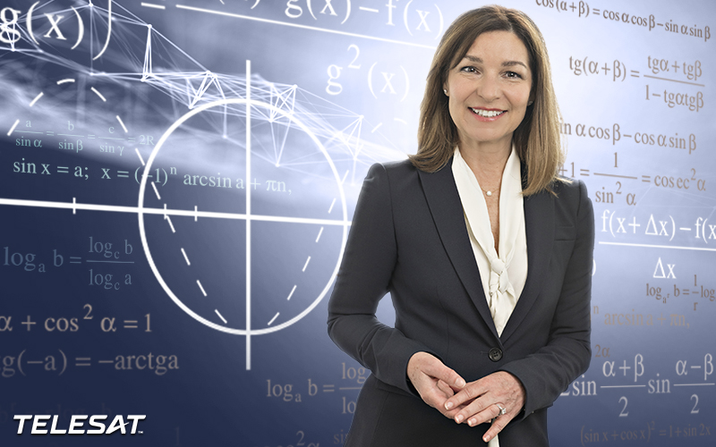 Michele Beck standing in front of black board with formulas written as a stylized background