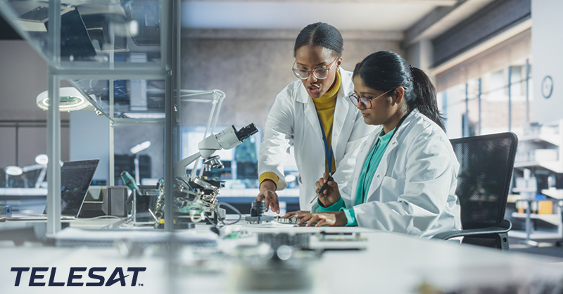 Two women working together in a technical lab