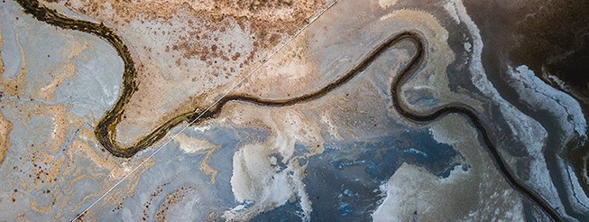 Aerial view of mountain landscape with water