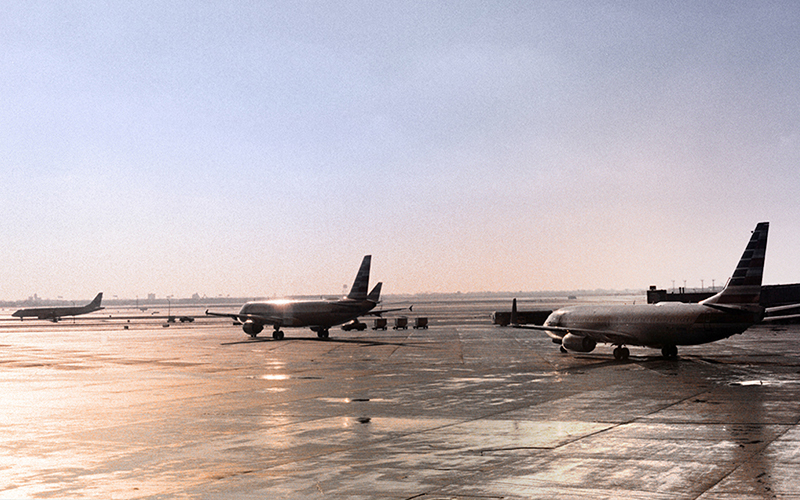 The images shows a few airplanes landed at the airport.