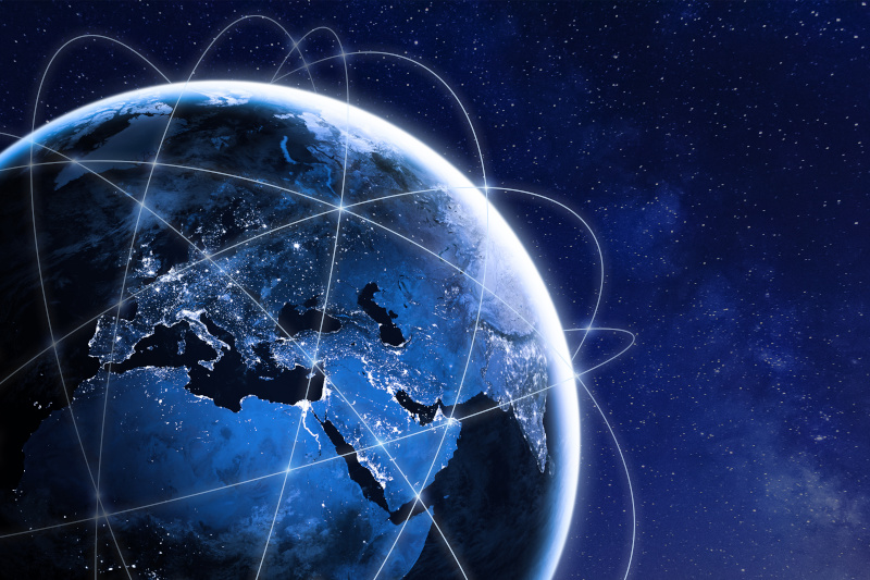 Digital view of Earth from space with glowing network connections linking Europe, Africa, and Asia, representing global connectivity, communications networks, and worldwide digital infrastructure.