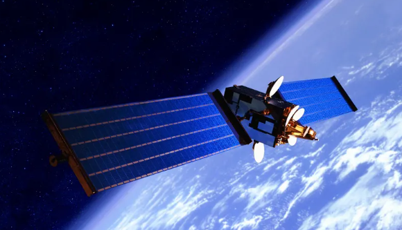 Image from space of Earth with a communications satellite in view
