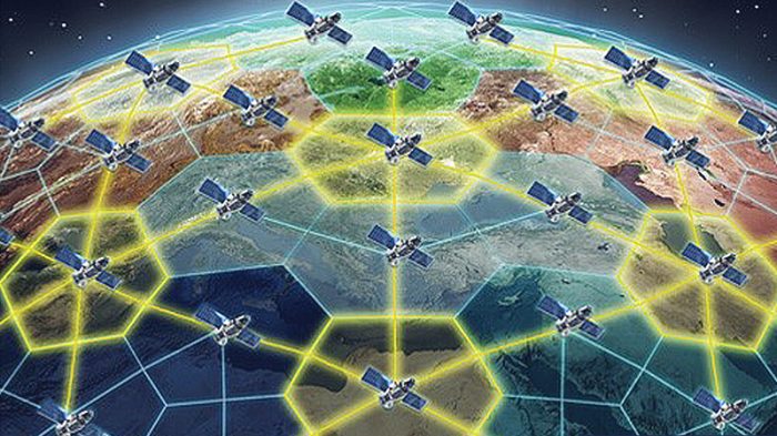 Image from DARPA depicting low earth satellites communicating above the Earth