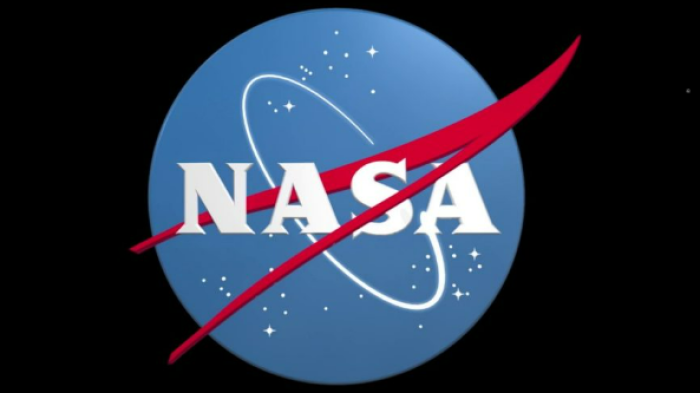 NASA logo on clip art of Earth over black background